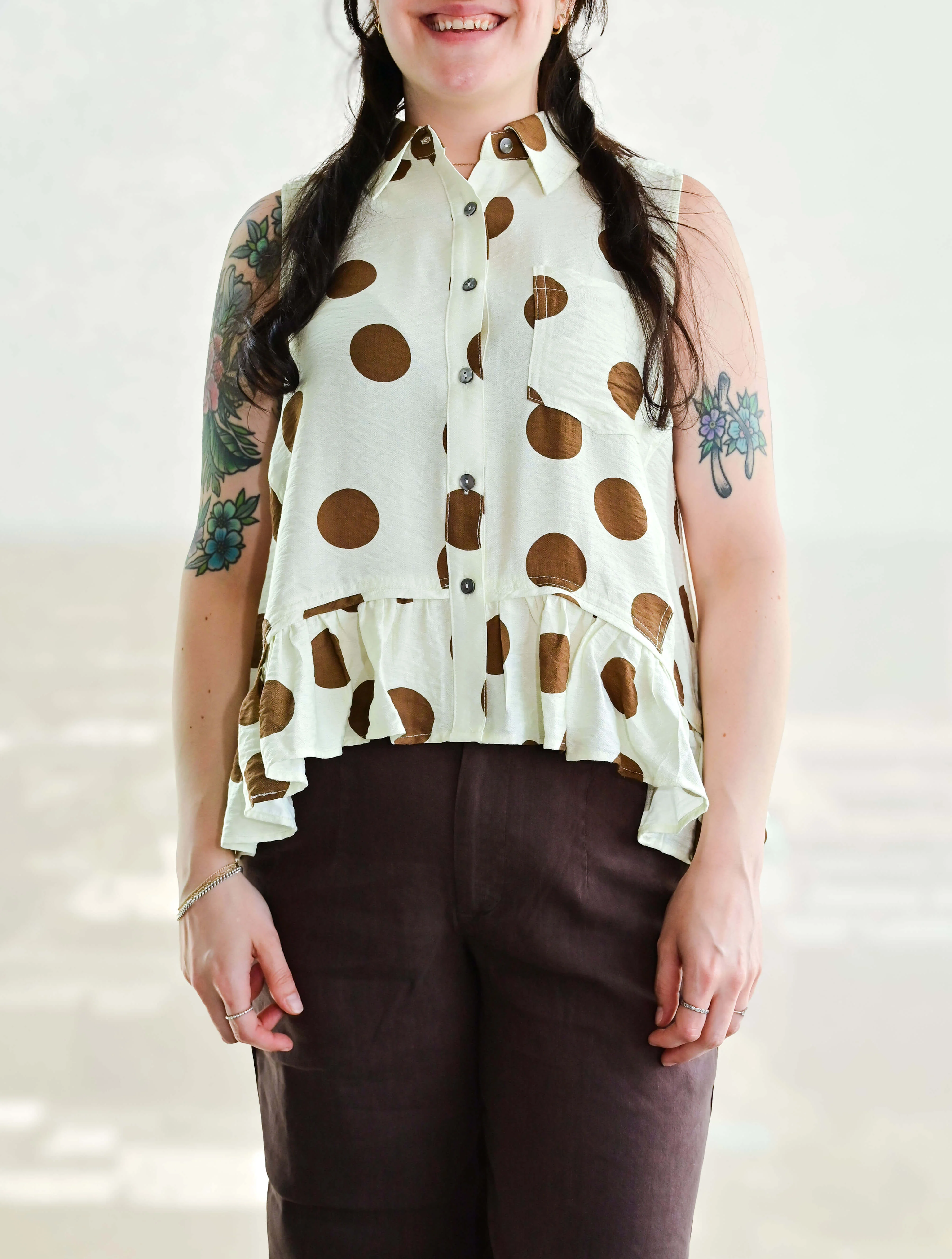 Polka Dot Sleeveless Button Up Blouse With Ruffle Hem - Image 3